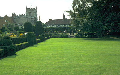 New Place Gardens, the site of the house Shakespeare lived in when not in London, with the Guild Chapel in the background: July 1968.